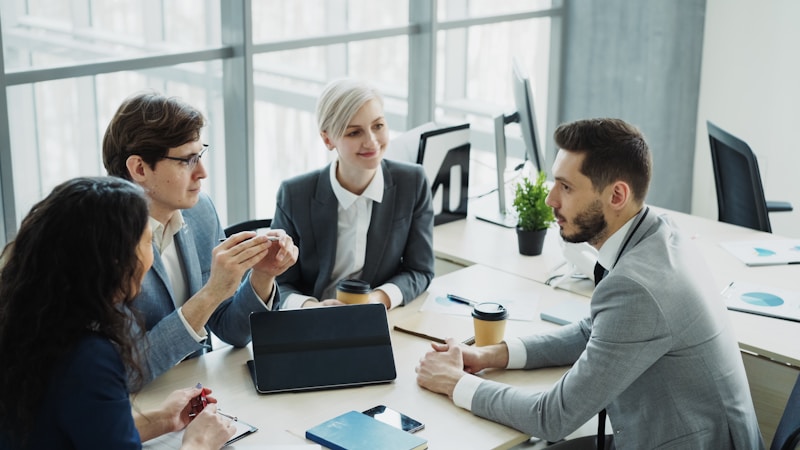 A businessman discussing a project with colleagues